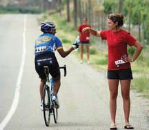 Winner for finishing: Sneeta Takhar taking water from the support team.